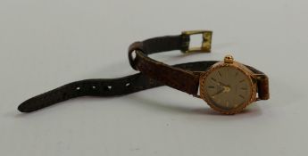 Ladies 9ct gold Rotary wristwatch with leather strap: 8.6g.