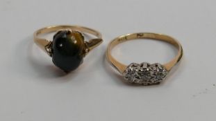 Two 9ct gold ladies rings: one set with diamonds and the other with polished stone, 3.9g.