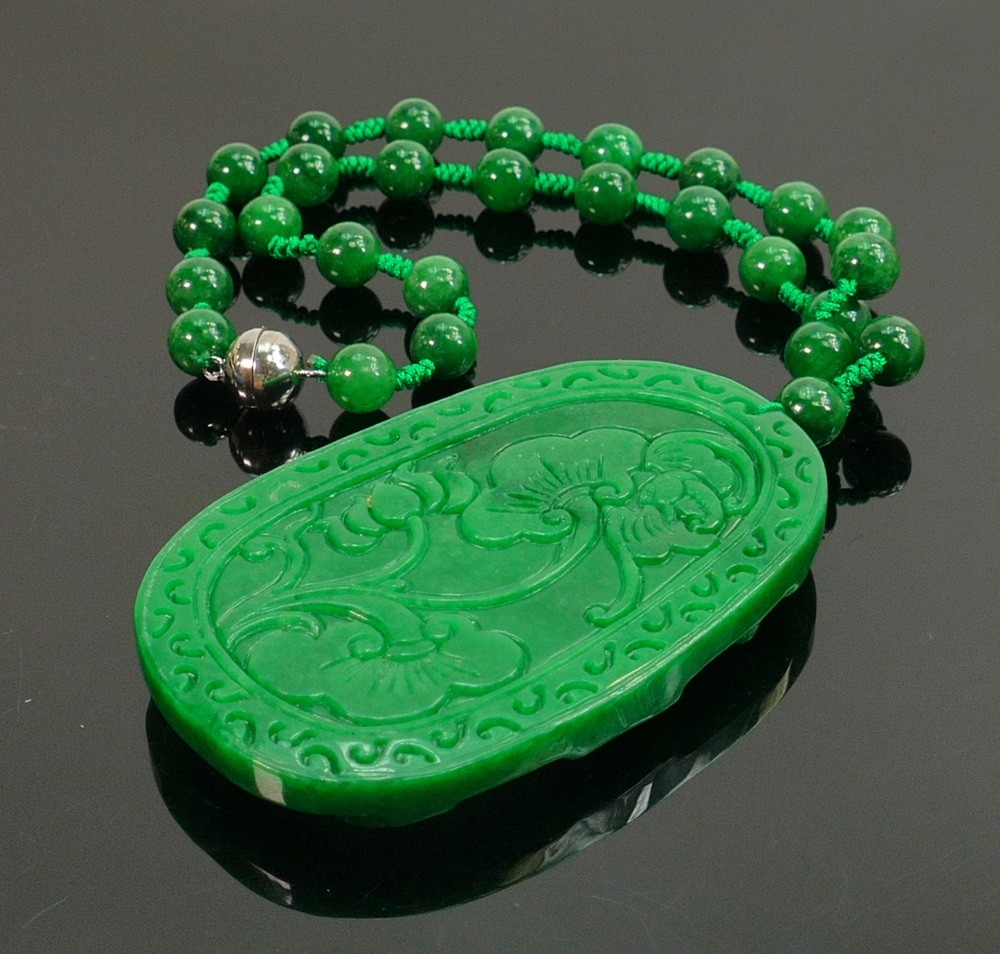 Carved Jade large oval pendant & necklace: Carved with a wild horse, with bead necklace.