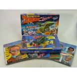 A collection of Thunderbird items to include : Carlton carded TB2 figure, similar mouse mats,