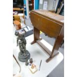 A mixed collection of items to include: Spelter Industry Theme Figure, Small Oak Table, Opera