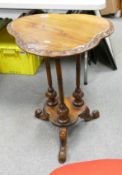Reproduction Shaped Walnut Table: on 3 carved supports