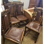 Set of 4 Victorian oak dining chairs: leather seat pads, carved crown detail.