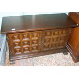 A reproduction dark oak side cabinet/media unit: 102cm wide.