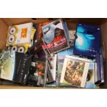 A large quantity of DVD's & CD's: mixed themes and genres.