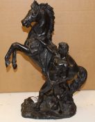 A large bronze figure of a rearing horse and Greek horseman: 40cm in height.