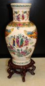 Large Reproduction Oriental Vase on wooden base: height 47cm overall.