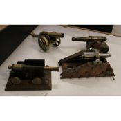 A collection of Brass, Bronze & Similar Ornamental Cannons: length of largest 20cm(4)