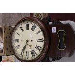 Early 20th century mahogany drop dial wall clock: with key and pendulum.