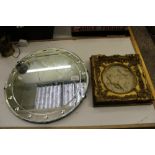 A mid century circular wall mirror: together with a gilt/gesso framed classical plaque (2).