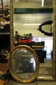 Two gilt framed mirrors: both bevel edged, largest measures 134cm x 73cm (2).