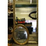 Two gilt framed mirrors: both bevel edged, largest measures 134cm x 73cm (2).