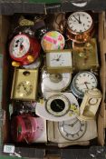 A collection of vintage mantle clocks and alarm clocks: (1 tray).