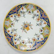 Early continental tin glazed plate, possibly Dutch, designed with polychrome flowers: diameter 22.