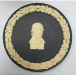 Wedgwood Yellow on Black Basalt Guinness Commemorative Plate: diameter 16.5cm