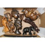 A collection of carved African themed items: animals, busts etc (1 tray).