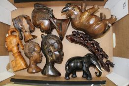 A collection of carved African themed items: animals, busts etc (1 tray).