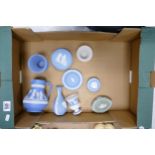 A collection of Wedgwood Jasperware including: water jug, vases, pin trays, green lidded box with