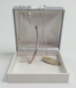 Three Silver necklaces: two have silver pendants, 20.4g. (3)