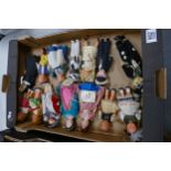 A collection of early twenty century Tourist & similar dolls, some automated items noted