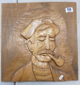 Carved Wooden Panel with image of fisherman: 40 x 38cm