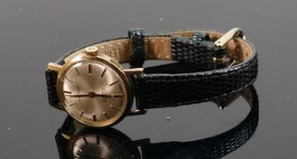 9ct gold ladies Garrard wristwatch with leather strap: 25 years service inscription to rear of the