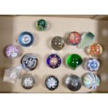 A collection of Glass Paperweights in varying styles & Shapes: