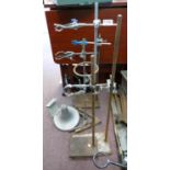 A collection of scientific items suitable for steampunk builds including: metal Chemistry stands (5)