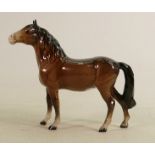 Beswick brown head up pony 1197: (Tiny nick to point of one ear).