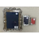Modern Hallmarked Silver Mounted Picture Frames: largest 25cm x 21(3)