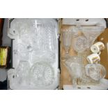 A Collection of cut & pressed glassware: to include Vases, bowls, decanters, etc. (2 Trays)