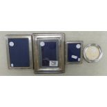 Modern Hallmarked Silver Mounted Picture Frames: largest 18.5cm x 14(4)