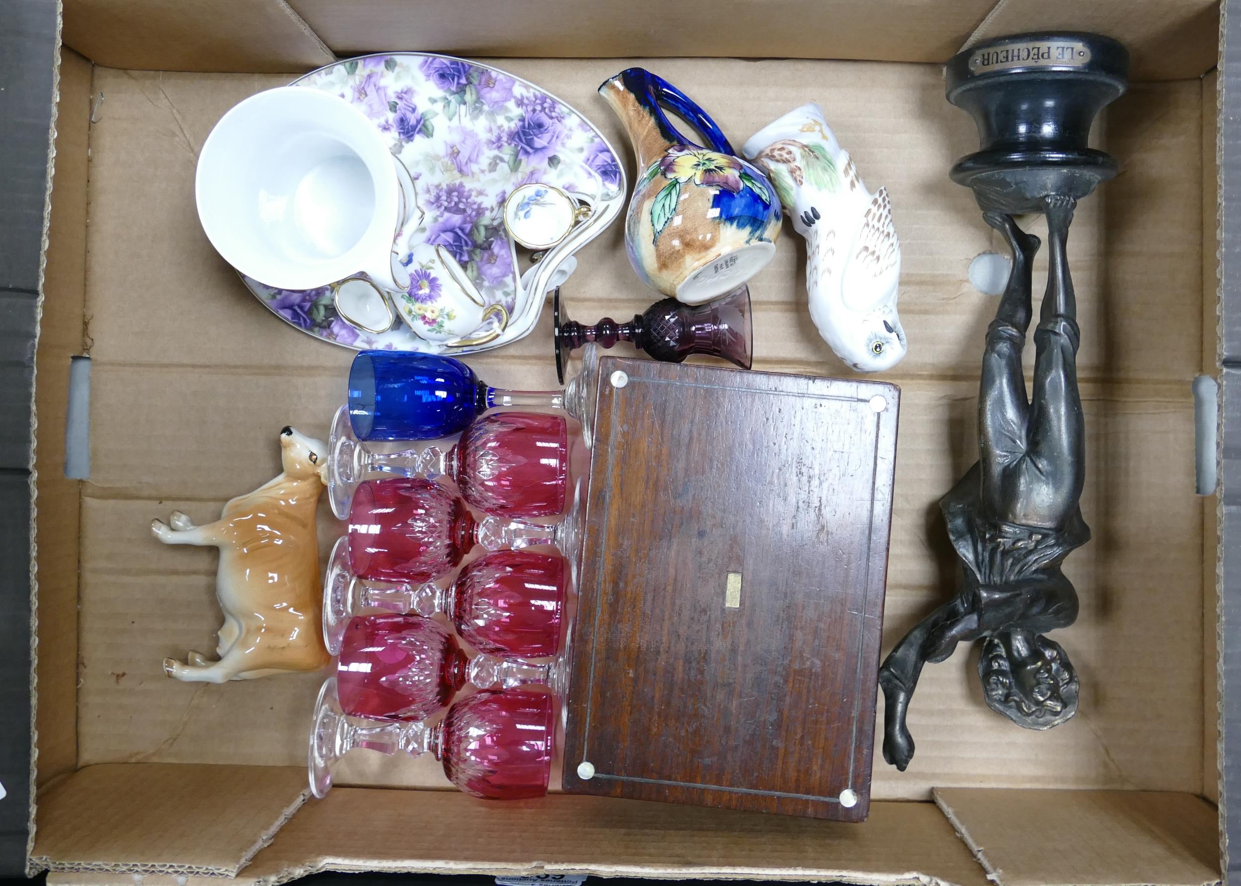 A mixed colletion of items to include: cranberry glass ware, floral decorated tea ware, bronzed