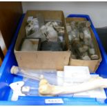 A collection of specimen bones: skulls and similar