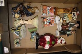A mixed collection of items to include: Continental figures, resin figures, decorative clown