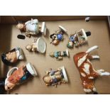 A collection of Goebel figures: gloss cow figure and 6 matt child figures, together with a