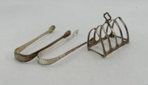Silver toast rack: together with two silver sugar tongs. Total weight 137grams