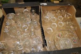 A mixed collection of glass ware items to include: drinking glasses, tumblers etc (2 trays).
