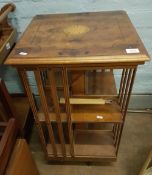 Edwardian walnut inlaid revolving bookcase: 78cm in height, slightly a/f (1 upright damaged, but