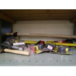 A collection of hand tools: hammers, pliers, tape measures etc.