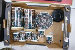 A collection of Portmerion magic city patterned cups, saucers: together with storage boxes