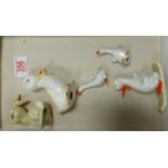 A collection of Beswick comical animals: including duck on skis, Duck with ladybird etc (5)