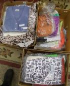 A large quantity of ladies clothing: jumpers, skirts, tops etc (3 trays).