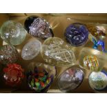 A collection of glass paperweights: (12).