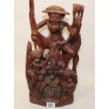 Carved Oriental hardwood figure: 46cm tall.