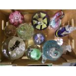 A collection of glass paperweights: (11).