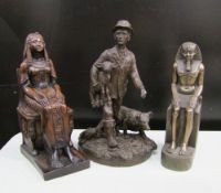 Three resin figures: one bronze effect farmer, one bronze effect Egyptian and one wood effect