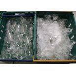 A large quantity of drinking glasses: sherry glasses, aperitif glasses etc (2 trays).