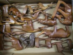 A collection of carved wooden animals: elephants, antelope, rhinos etc (1 tray).