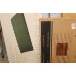 Amazon returned items: boxed Dimplex hearth pad together with a boxed wooden shower mat.